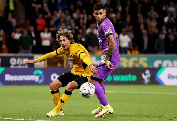 Fabio Silva of Wolverhampton Wanderers is challenged by Cristian Romero of Tottenham Hotspur during the Carabao Cup Third Round match between...
