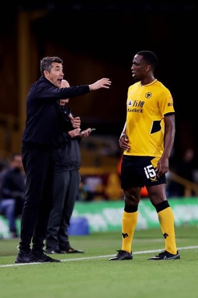 Bruno Lage, Manager of Wolverhampton Wanderers gives instructions to Willy Boly of Wolverhampton Wanderers during the Carabao Cup Third Round match...