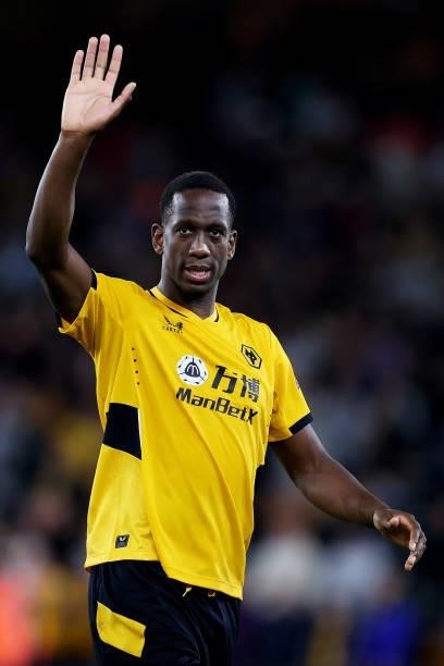 Willy Boly of Wolverhampton Wanderers shows appreciation to the fans following the Carabao Cup Third Round match between Wolverhampton Wanderers and...