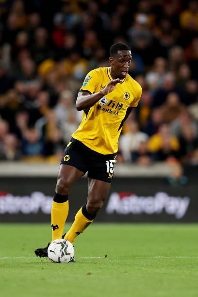 Willy Boly of Wolverhampton Wanderers runs with the ball during the Carabao Cup Third Round match between Wolverhampton Wanderers and Tottenham...