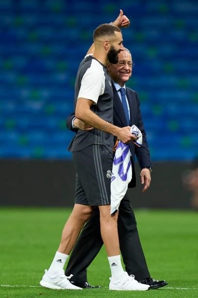 Karim Benzema and Florentino Perez president of Real Madrid CF embrace after the game during the La Liga Santander match between Real Madrid CF and...