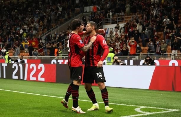 Theo Hernandez of AC Milan celebrates his goal with his team-mate Sandro Tonali during the Serie A match between AC Milan and Venezia FC at Stadio...