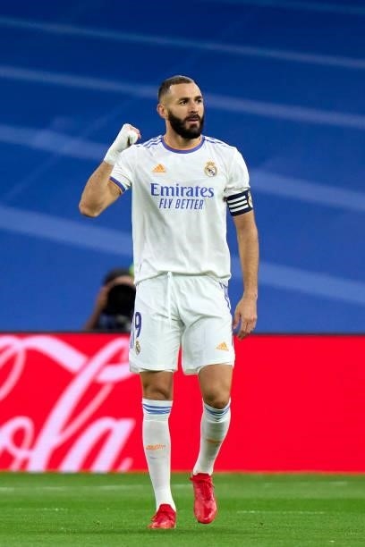 Karim Benzema of Real Madrid CF celebrates after scoring his team's first goal during the La Liga Santander match between Real Madrid CF and RCD...