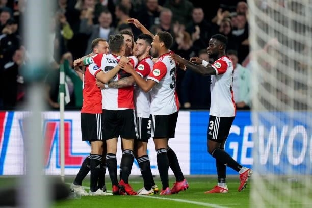 Guus Til of Feyenoord celebrate with teammates after convert the third goal for his team during the Dutch Eredivisie match between Feyenoord and SC...