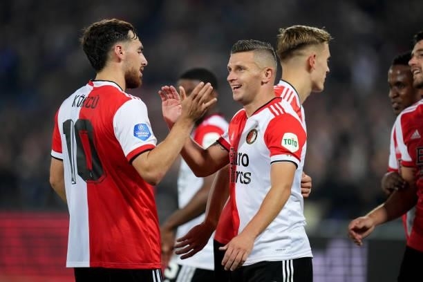 Bryan Linssen of Feyenoord celebrates with Orkun Kokcu of Feyenoord after scoring the second goal for his team during the Dutch Eredivisie match...
