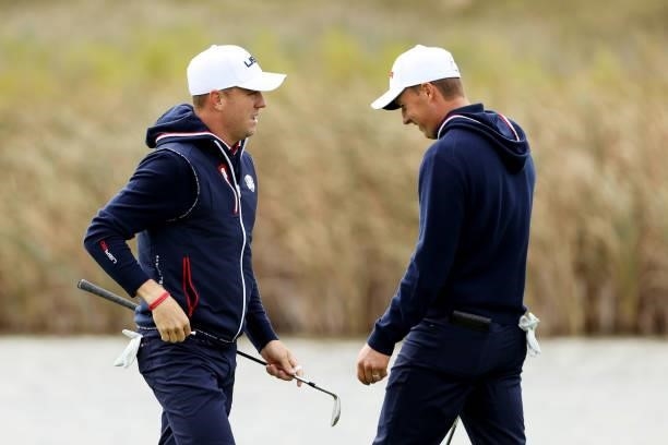 Justin Thomas of team United States and Jordan Spieth of team United States walk across the course during practice rounds prior to the 43rd Ryder Cup...