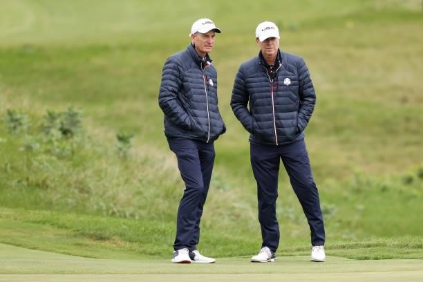 Vice-captain Jim Furyk of team United States and captain Steve Stricker of team United States look on during practice rounds prior to the 43rd Ryder...