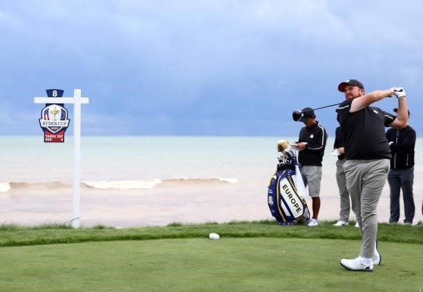 Shane Lowry of Ireland and team Europe plays his shot from the eighth tee during practice rounds prior to the 43rd Ryder Cup at Whistling Straits on...