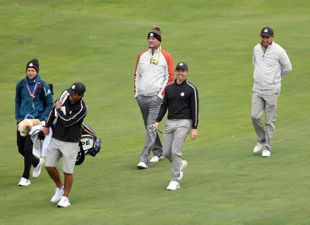 Vice-captain Robert Karlsson of Sweden and team Europe, Rory McIlroy of Northern Ireland and team Europe, and captain Padraig Harrington of Ireland...