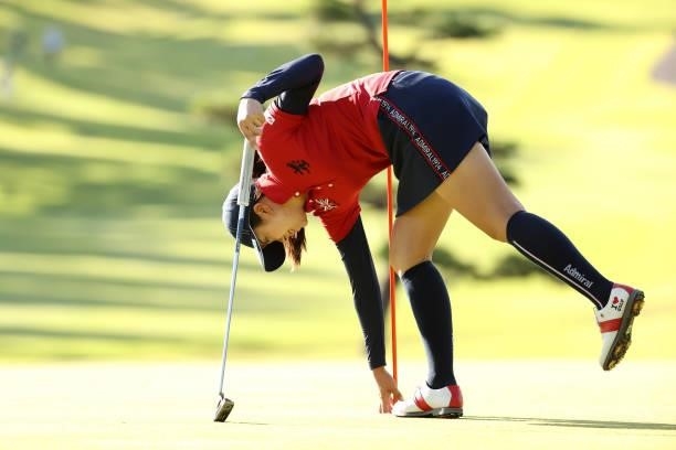 Kotone Hori of Japan reacts after a putt on the 16th green during the first round of the Miyagi TV Cup Dunlop Ladies Open at Rifu Golf Club on...