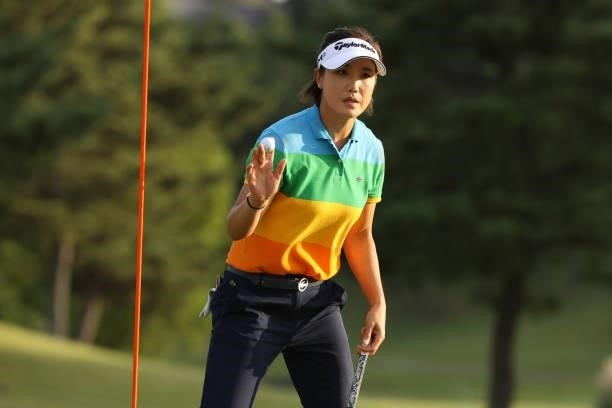 Mi-jeong Jeon of South Korea applauds after holing out on the 18th green during the first round of the Miyagi TV Cup Dunlop Ladies Open at Rifu Golf...