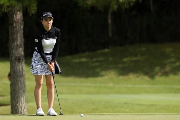 Akira Yamaji of Japan lines up a putt on the 13th green during the first round of the Miyagi TV Cup Dunlop Ladies Open at Rifu Golf Club on September...