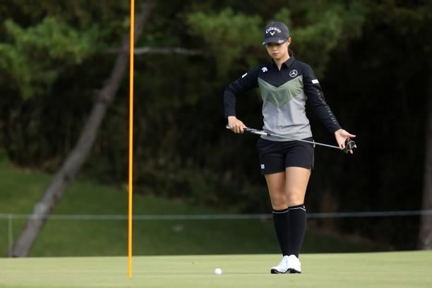 Asuka Kashiwabara of Japan lines up a putt on the 14th green during the first round of the Miyagi TV Cup Dunlop Ladies Open at Rifu Golf Club on...