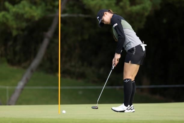 Asuka Kashiwabara of Japan holes the birdie putt on the 14th green during the first round of the Miyagi TV Cup Dunlop Ladies Open at Rifu Golf Club...
