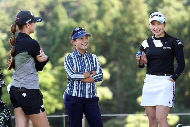 Asuka Kashiwabara, Serena Aoki and Sakura Koiwai of Japan share a laugh before the 15th hole during the first round of the Miyagi TV Cup Dunlop...
