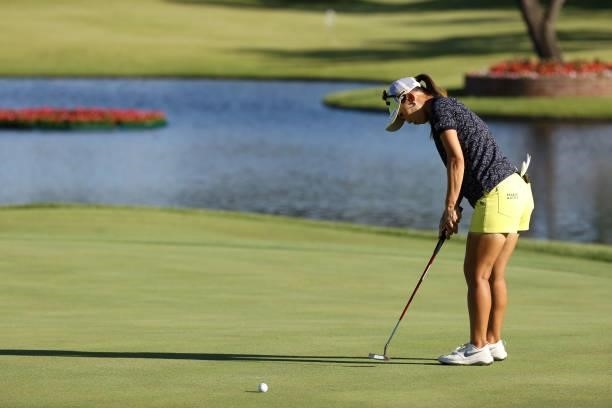 Momoko Ueda of Japan attempts a putt on the 15th green during the first round of the Miyagi TV Cup Dunlop Ladies Open at Rifu Golf Club on September...