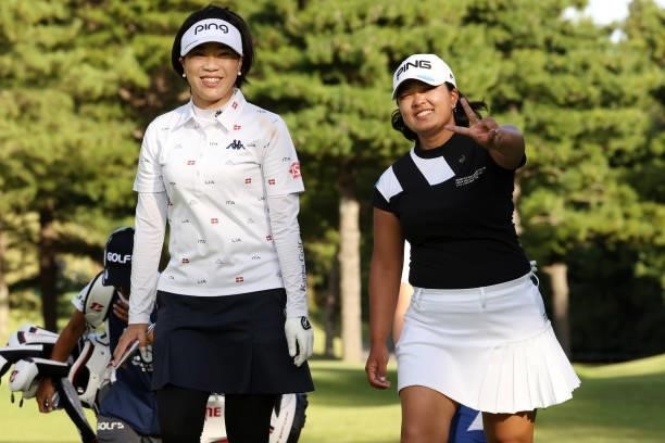 Shiho Oyama and Ai Suzuki of Japan pose on the 17th hole during the first round of the Miyagi TV Cup Dunlop Ladies Open at Rifu Golf Club on...
