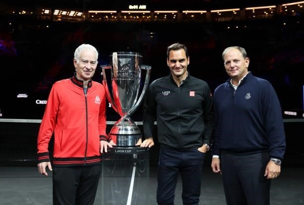 John McEnroe Team World Captain, Roger Federer and Tony Godsick Laver Cup Chairman pose for a photograph with the Laver Cup Trophy after taking part...