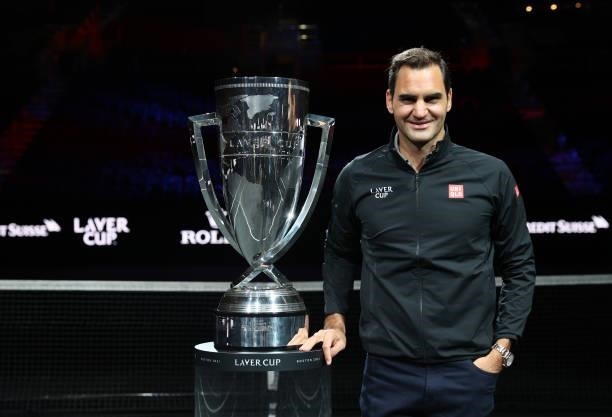 Roger Federer poses for a photograph with the Laver Cup Trophy after taking part in a live TV interview on CNBC at TD Garden on September 24, 2021 in...
