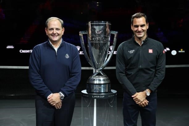 Tony Godsick Laver Cup Chairman and Roger Federer pose for a photograph with the Laver Cup Trophy after taking part in a live TV interview on CNBC at...