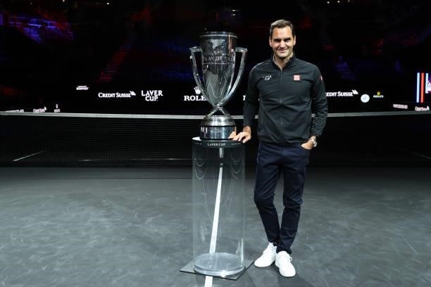 Roger Federer poses for a photograph with the Laver Cup Trophy after taking part in a live TV interview on CNBC at TD Garden on September 24, 2021 in...