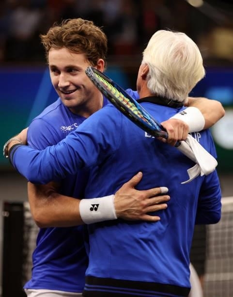 Casper Ruud of Team Europe celebrates his match point over Reilly Opelka of Team World with Team Europe Captain Björn Borg during the first match...