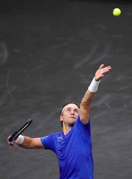 Casper Ruud of Team Europe serves a shot to Reilly Opelka of Team World during the first match during Day 1 of the 2021 Laver Cup at TD Garden on...