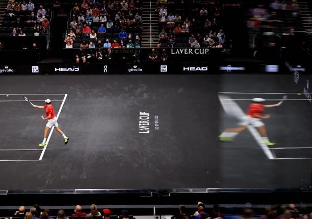 Reilly Opelka of Team World plays a shot to Casper Ruud of Team Europe during the first match during Day 1 of the 2021 Laver Cup at TD Garden on...