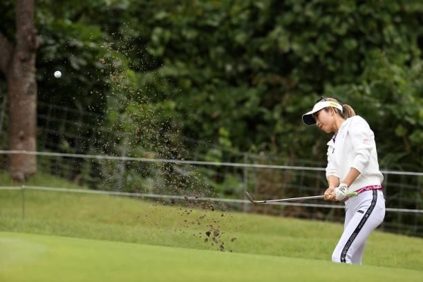 Kumiko Kaneda of Japan hits out from a bunker on the 1st hole during the second round of the Miyagi TV Cup Dunlop Ladies Open at Rifu Golf Club on...