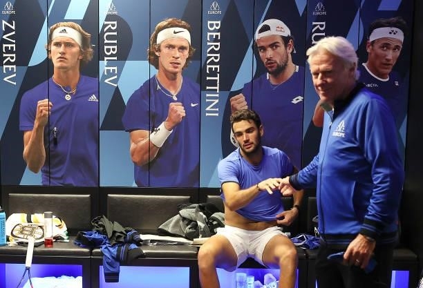 Matteo Berrettini of Team Europe is congratulated by Team Europe Captain Björn Borg in the locker room after winning the second set against Felix...