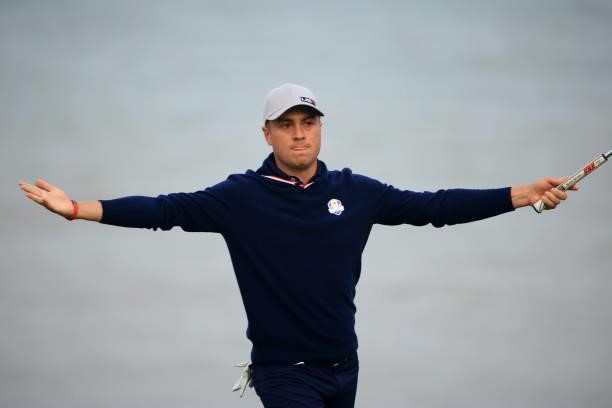 Justin Thomas of team United States reacts to his eagle on the 16th hole during Friday Afternoon Fourball Matches of the 43rd Ryder Cup at Whistling...