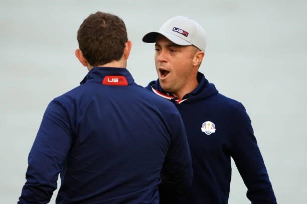 Justin Thomas of team United States and Patrick Cantlay of team United States celebrate on the 16th green during Friday Afternoon Fourball Matches of...
