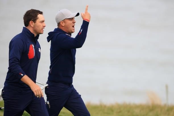 Justin Thomas of team United States and Patrick Cantlay of team United States celebrate on the 16th green during Friday Afternoon Fourball Matches of...