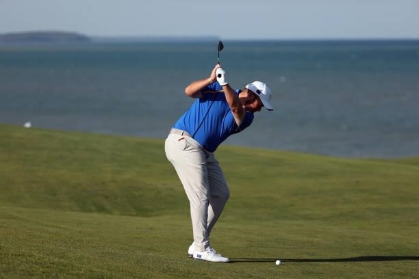 Shane Lowry of Ireland and team Europe plays a shot on the 15th hole during Friday Afternoon Fourball Matches of the 43rd Ryder Cup at Whistling...