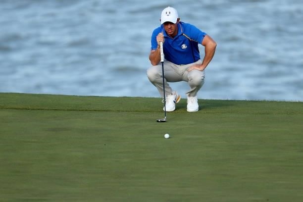 Rory McIlroy of Northern Ireland and team Europe lines up a putt during Friday Afternoon Fourball Matches of the 43rd Ryder Cup at Whistling Straits...