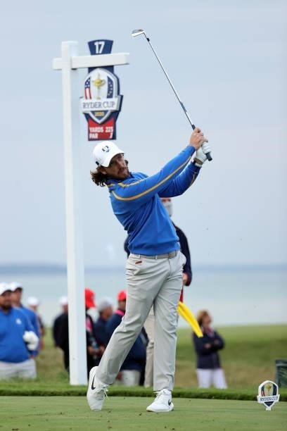 Tommy Fleetwood of England and team Europe plays his shot from the 17th tee during Friday Afternoon Fourball Matches of the 43rd Ryder Cup at...