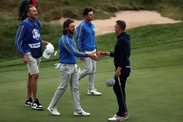 Viktor Hovland of Norway and team Europe, Tommy Fleetwood of England and team Europe Patrick Cantlay of team United States and Justin Thomas of team...
