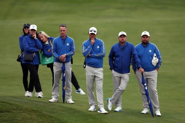 Shane Lowry of Ireland and team Europe, vice-captain Graeme McDowell of Northern Ireland and team Europe, captain Padraig Harrington of Ireland and...