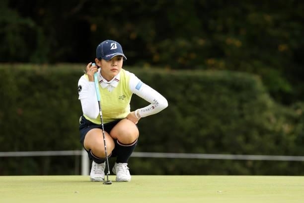 Yuri Yoshida of Japan lines up a putt on the 2nd green during the second round of the Miyagi TV Cup Dunlop Ladies Open at Rifu Golf Club on September...
