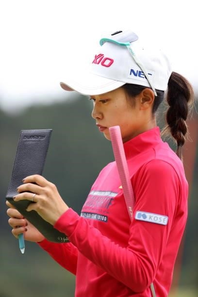 Yuka Yasuda of Japan checks the yardage book during the second round of the Miyagi TV Cup Dunlop Ladies Open at Rifu Golf Club on September 25, 2021...