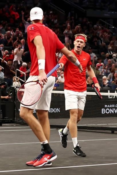 John Isner and Denis Shapovalov of Team World celebrate during their doubles match against Alexander Zverev and Matteo Berrettini of Team Europe...