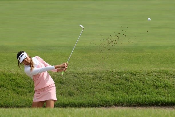 Eimi Koga of the United States hits out from a bunker on the 8th hole during the second round of the Miyagi TV Cup Dunlop Ladies Open at Rifu Golf...