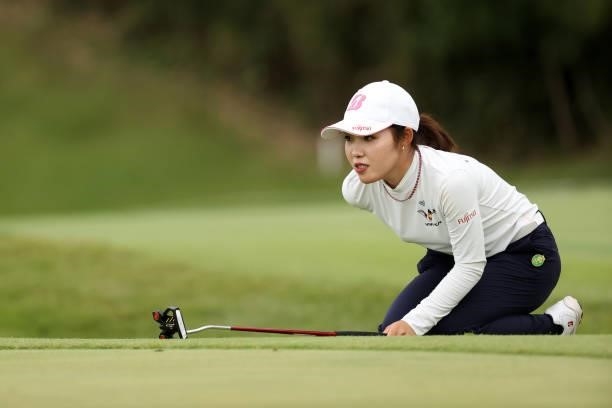 Ayaka Furue of Japan lines up a putt on the 18th green during the second round of the Miyagi TV Cup Dunlop Ladies Open at Rifu Golf Club on September...