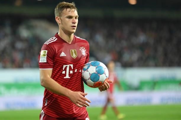 Joshua Kimmich of FC Bayern Muenchen holds the ball during the Bundesliga match between SpVgg Greuther Fürth and FC Bayern München at Sportpark...