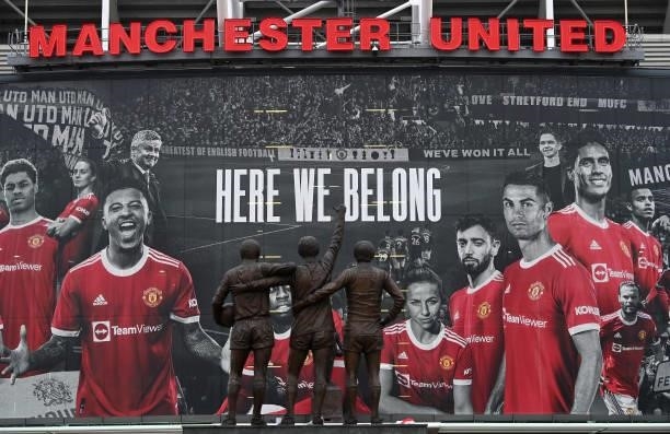 View of the Holy Trinity statue of Sir Bobby Charlton, Denis Law and George Best is seen outside the stadium prior to the Premier League match...
