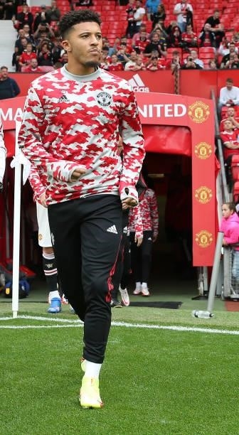 Jadon Sancho of Manchester United warms up ahead of the Premier League match between Manchester United and Aston Villa at Old Trafford on September...
