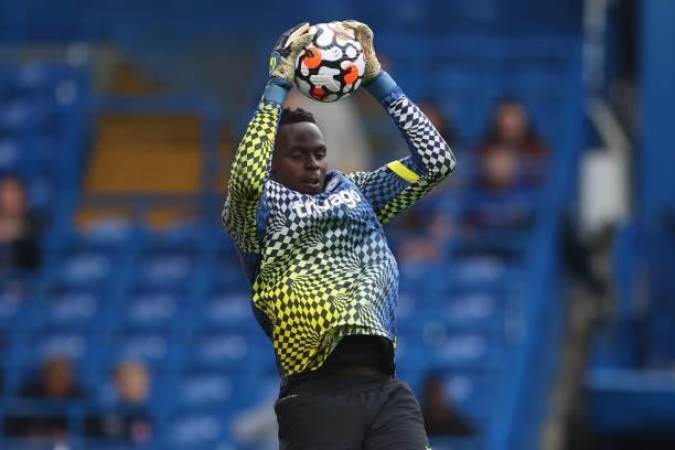 Edouard Mendy of Chelsea warms up prior to the Premier League match between Chelsea and Manchester City at Stamford Bridge on September 25, 2021 in...