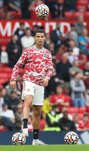 Cristiano Ronaldo of Manchester United warms up ahead of the Premier League match between Manchester United and Aston Villa at Old Trafford on...