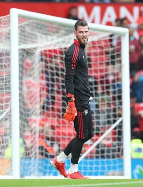David de Gea of Manchester United warms up ahead of the Premier League match between Manchester United and Aston Villa at Old Trafford on September...