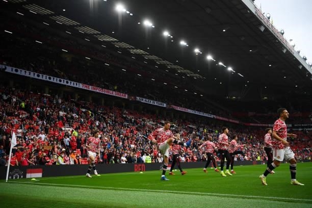 General view inside the stadium as the Manchester United squad warm up prior to the Premier League match between Manchester United and Aston Villa at...
